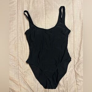 Black one piece with a low back and thick straps !!